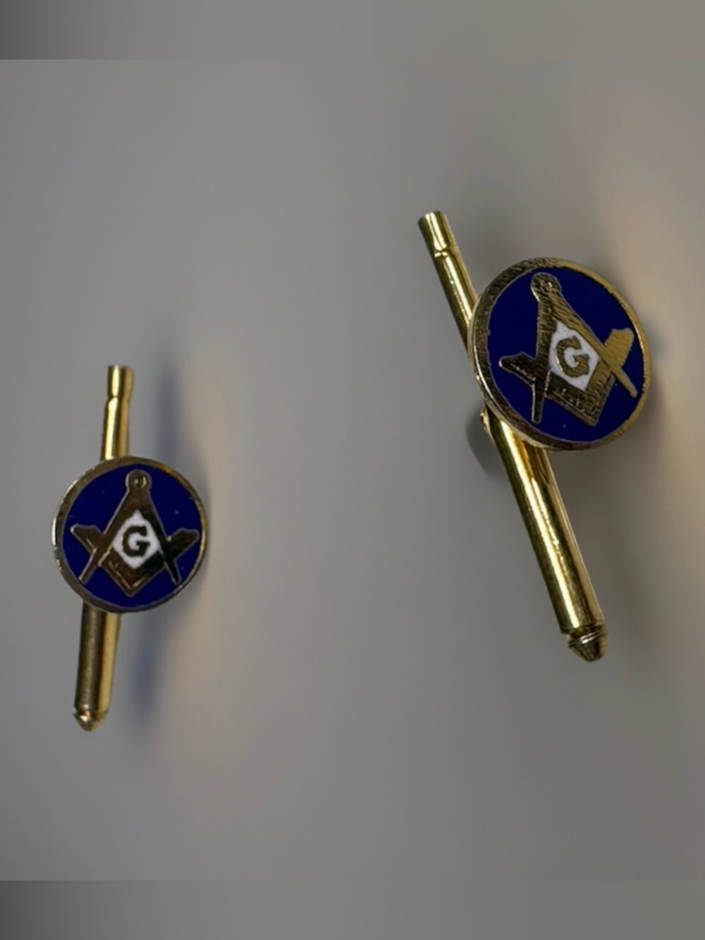 A Pair of Gold-Tone and Blue Masonic Cufflinks/ shirt studs with Enamel Emblem